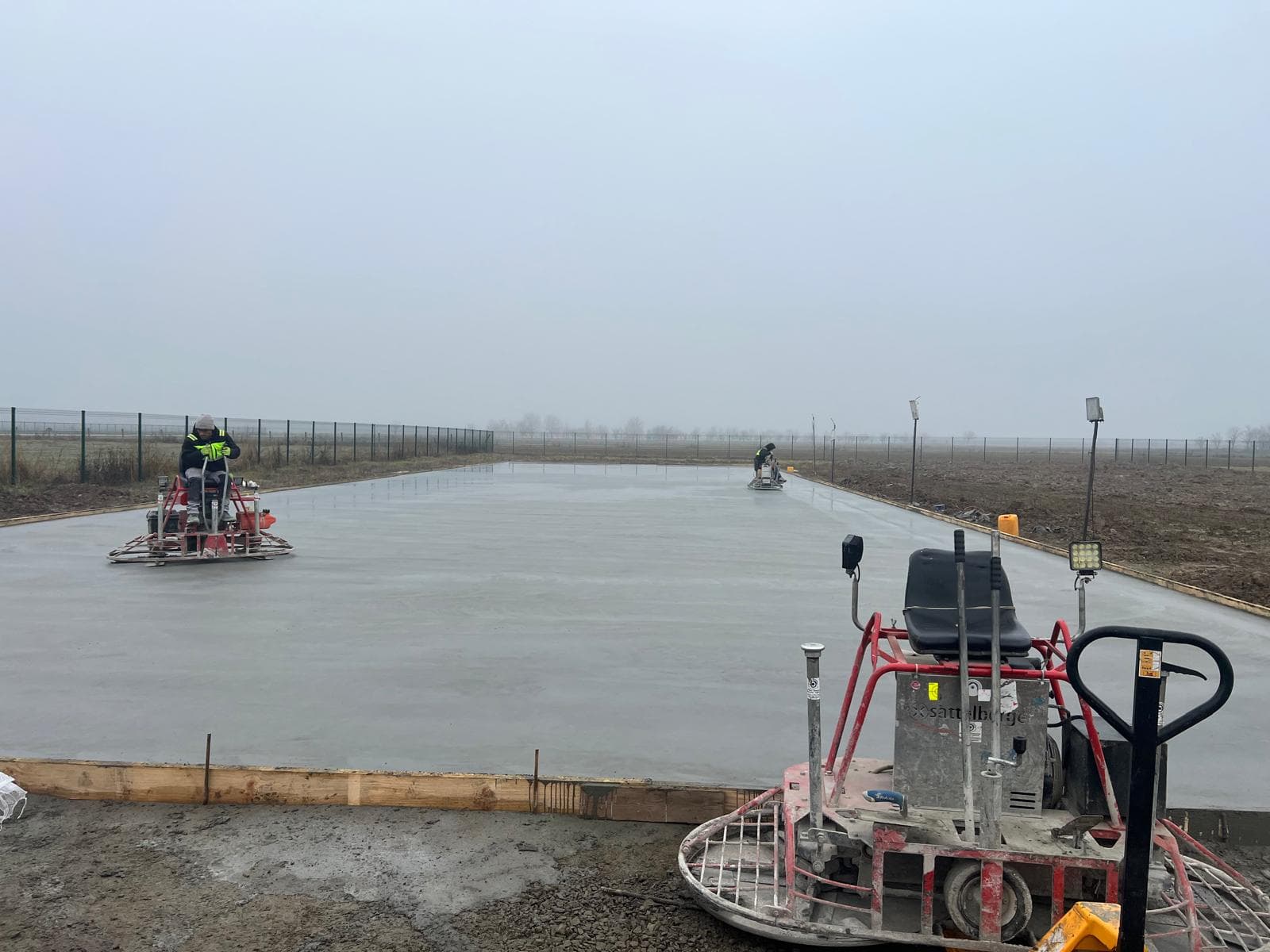 Construction services — Calor crew installing a concrete slab